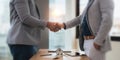 Close up of African American business man and Indian man shaking hands while at the office with diversity Royalty Free Stock Photo