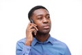 Close up african american businessman talking on cellphone by isolated white background Royalty Free Stock Photo