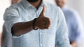 Close up African American executive extending hand for handshake Royalty Free Stock Photo
