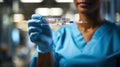 Close-up of african american female doctor holding test