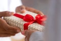 Close up African American female hands holding gift box Royalty Free Stock Photo