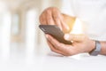 Close up of african american man hands using smartphone Royalty Free Stock Photo