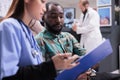 Close up of african american man reviewing medical records Royalty Free Stock Photo