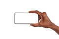 Black woman hand holds smart phone horizontally