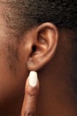 Close up of african american woman`s ear Royalty Free Stock Photo