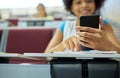Close up of african student with smartphone Royalty Free Stock Photo