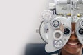 Close-up Of african teen girl Doing Eye Test On Phoropter, African teen girl checking on her eye with optometry machine. copy Royalty Free Stock Photo