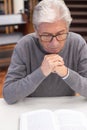 Close-up of aged man reading book with interest Royalty Free Stock Photo