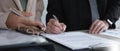 Close-up of the agreement document being signed. Business contract of young businesswoman Royalty Free Stock Photo