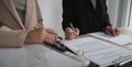 Close-up of the agreement document being signed. Business contract of young businesswoman Royalty Free Stock Photo