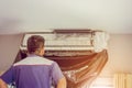 Close up of Air Condition, repairman on the floor fixing air con Royalty Free Stock Photo