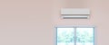 Close up air conditioner split type wall mount with window in home room concepts of cool or heat or hot temperature and air clean Royalty Free Stock Photo