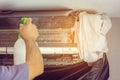 Close up of Air Conditioning Repair, repairman on the floor fixing air conditioning system Royalty Free Stock Photo