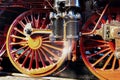 Close-up of an air pump and wheels of a steamer