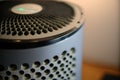 close-up of air purifier, with visible streams of clean air