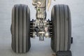 Close up of aircraft wheel and engine at tarmac. Landing gear Royalty Free Stock Photo