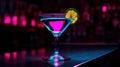 Close up of alcoholic cocktail, beverage, drink, prepared by professional barman in multicolored neon light.