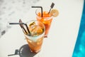 close-up of alcoholic drinks, mojito with lime and ice and gin and tonic lemonade served cold Royalty Free Stock Photo