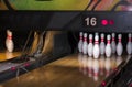 Close up of alley at bowling club. pin bowling alley background. Closeup of ten pin row on a lane, night light and sphere ball . V Royalty Free Stock Photo