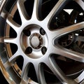 Close up of alloy wheels on shelves