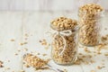 Close Up Almond Granola In Glass Jars