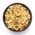 Close-Up of Aloo Mixture in a black Ceramic bowl made with potatoes, peanuts, raisins. Indian spicy snacks Namkeen,
