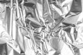 Close up of aluminium foil crumpled. Silver aluminium foil texture background. Abstract metallic paper pattern. Texture ofClose up