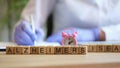 Alzheimer word collected with wooden blocks in row