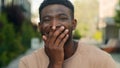 Close up amazed wonder male face African American man biracial shocked guy open mouth shock amazing news surprise face Royalty Free Stock Photo