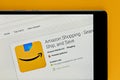 Close-up of Amazon Shopping app store logo on tablet screen