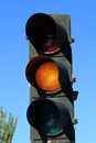 Amber traffic light in San Modesto street in Madrid, Spain.