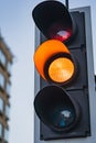 Close Up of an Amber Traffic Light Illuminated