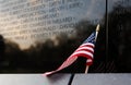 Close Up of American Flag Leaning Against Vietnam War Memorial, Washington DC, USA