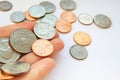 American quarter, dime coins in hand on dollar usa background Royalty Free Stock Photo