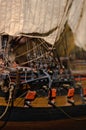 Close-up of an anchor of a wooden model boat