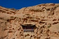 CLOSE UP: Ancient Buddhist built into solid rock of majestic Linsong mountain