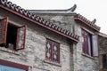 Close-up of ancient building exterior walls and plants in a Chinese style garden Royalty Free Stock Photo