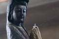 Close up of Ancient Chinese Buddha Statue: Guanyin black