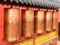 Close-up of ancient prayer copper wheel in Buddhist Temple