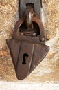 Ancient rusty padlock with a keyhole