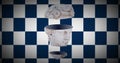 Close up of ancient sculpture male head sliced in three on blue and white background