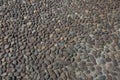 Close up of Ancient Stone Ground: Cobblestone Road in City Street in Italy Royalty Free Stock Photo