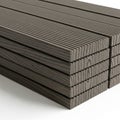 Stack Of Dark Brown Composite Decking Boards With Grooved Texture On White Background Royalty Free Stock Photo