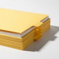 Stack of Yellow File Folders with Tabs on a White Background document paperwork Royalty Free Stock Photo