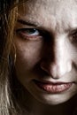 Close up on angry evil upset scary face Royalty Free Stock Photo