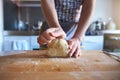 Close up of anonymous Woman making fresh dough at home in her kitchen