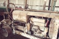 Close up of antique farm equipment in an old barn Royalty Free Stock Photo