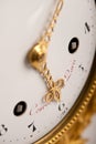 Close-up of antique gold clock