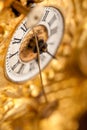 Close-up of antique gold clock