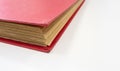 Close up of antique red book on white table Royalty Free Stock Photo